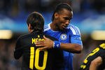 LONDON, ENGLAND - APRIL 18:  Didier Drogba of Chelsea hugs Lionel Messi of Barcelona during the UEFA Champions League Semi Final first leg match between Chelsea and Barcelona at Stamford Bridge on April 18, 2012 in London, England.  (Photo by Michael Regan/Getty Images)
