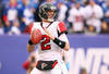 EAST RUTHERFORD, NJ - JANUARY 08:  Matt Ryan #2 of the Atlanta Falcons looks to pass against the New York Giants during their NFC Wild Card Playoff game at MetLife Stadium on January 8, 2012 in East Rutherford, New Jersey.  (Photo by Al Bello/Getty Images)
