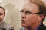FORT WORTH, TX - OCTOBER 10:  Texas Christian University head football coach Gary Patterson (R) speaks to the media during a press conference after TCU accepted an invention to join the Big XII conference on October 10, 2011 in Fort Worth, Texas. (Photo by Brandon Wade/Getty Images)