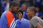 OKLAHOMA CITY, OK - MAY 14:  Kevin Durant #35 and Russell Westbrook #0 of the Oklahoma City Thunder talk late in the second half against the Los Angeles Lakers in Game One of the Western Conference Semifinals in the 2012 NBA Playoffs on May 14, 2012 at the Chesapeake Energy Arena in Oklahoma City, Oklahoma. Oklahoma City defeated Los Angeles 119-90. NOTE TO USER: User expressly acknowledges and agrees that, by downloading and or using the photograph, User is consenting to the terms and conditions of the Getty Images License Agreement. (Photo by Brett Deering/Getty Images)