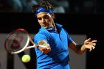 ROME, ITALY - MAY 17:  Roger Federer of Switzerland plays a forehand in his match against Juan Carlos Ferrero of Spain during day six of the Internazionali BNL d'Italia 2012 Tennis on May 17, 2012 in Rome, Italy.  (Photo by Julian Finney/Getty Images)