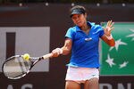 ROME, ITALY - MAY 16:  Li Na of China plays a forehand in her match against Iveta Benesova of Czech Republic during day five of the Internazionali BNL d'Italia 2012 Tennis on May 16, 2012 in Rome, Italy.  (Photo by Julian Finney/Getty Images)
