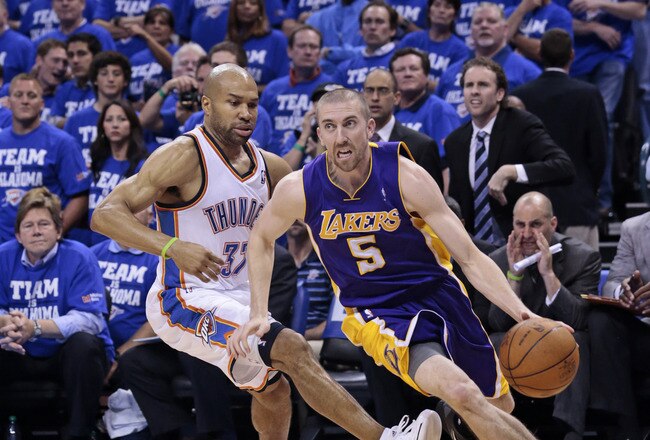 OKLAHOMA CITY, OK - MAY 16:  Steve Blake #5 of the Los Angeles Lakers drives around Derek Fisher #37 of the Oklahoma City Thunder in Game Two of the Western Conference Semifinals in the 2012 NBA Playoffs on May 16, 2012 at the Chesapeake Energy Arena in Oklahoma City, Oklahoma. The Thunder beat the Lakers 77-75.  NOTE TO USER: User expressly acknowledges and agrees that, by downloading and or using the photograph, User is consenting to the terms and conditions of the Getty Images License Agreement. (Photo by Brett Deering/Getty Images)