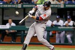 ST. PETERSBURG, FL - MAY 16:  Infielder Adrian Gonzalez #28 of the Boston Red Sox fouls off a pitch against the Tampa Bay Rays during the game at Tropicana Field on May 16, 2012 in St. Petersburg, Florida.  (Photo by J. Meric/Getty Images)