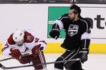 LOS ANGELES, CA - MAY 17:  Drew Doughty #8 of the Los Angeles Kings knocks over Shane Doan #19 of the Phoenix Coyotes in the third period in Game Three of the Western Conference Final during the 2012 NHL Stanley Cup Playoffs at Staples Center on May 17, 2012 in Los Angeles, California.  (Photo by Jeff Gross/Getty Images)