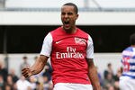 LONDON, ENGLAND - MARCH 31:  Theo Walcott of Arsenal celebrates scoring his side's equalising goal during the Barclays Premier League match between Queens Park Rangers and Arsenal at Loftus Road on March 31, 2012 in London, England.  (Photo by Ian Walton/Getty Images)