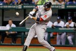 ST. PETERSBURG, FL - MAY 16:  Infielder Adrian Gonzalez #28 of the Boston Red Sox fouls off a pitch against the Tampa Bay Rays during the game at Tropicana Field on May 16, 2012 in St. Petersburg, Florida.  (Photo by J. Meric/Getty Images)