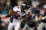 FOXBORO, MA - JANUARY 14:  Willis McGahee #23 of the Denver Broncos runs the ball against the New England Patriots during their AFC Divisional Playoff Game at Gillette Stadium on January 14, 2012 in Foxboro, Massachusetts.  (Photo by Al Bello/Getty Images)