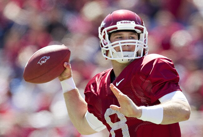 FAYETTEVILLE, AR - APRIL 21:   Quarterback Tyler Wilson #8 of the Arkansas Razorbacks Red Team throws a pass during the Spring Game at Donald W. Reynolds Stadium on April 21, 2012 in Fayetteville, Arkansas.  (Photo by Wesley Hitt/Getty Images)