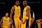 LOS ANGELES, CA - MAY 02:  Andrew Bynum #17 and Kobe Bryant #24 of the Los Angeles Lakers stand on the court before taking on the Dallas Mavericks in Game One of the Western Conference Semifinals in the 2011 NBA Playoffs at Staples Center on May 2, 2011 in Los Angeles, California. NOTE TO USER: User expressly acknowledges and agrees that, by downloading and or using this photograph, User is consenting to the terms and conditions of the Getty Images License Agreement.  (Photo by Kevork Djansezian/Getty Images)
