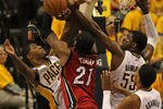 INDIANAPOLIS, IN - MAY 17: (L-R) Paul George #24, Roy Hibbert #55 and Danny Granger #33 of the Indiana Pacers pressure Ronny Turiaf #21 of the Miami Heat in Game Three of the Eastern Conference Semifinals in the 2012 NBA Playoffs at Bankers Life Fieldhouse on May 17, 2012 in Indianapolis, Indiana. The Pacers defeated the Heat 94-75. NOTE TO USER: User expressly acknowledges and agrees that, by downloading and/or using this photograph, User is consenting to the terms and conditions of the Getty Images License Agreement. (Photo by Jonathan Daniel/Getty Images)