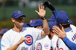 CHICAGO, IL - APRIL 05: Kerry Wood #34 of the Chicago Cubs greets the team during player introductions before the Cubs take on the Washington Nationals during the opening day game at Wrigley Field on April 5, 2012 in Chicago, Illinois. The Nationals defeated the Cubs 2-1.  (Photo by Jonathan Daniel/Getty Images)