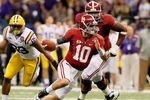 NEW ORLEANS, LA - JANUARY 09:  AJ McCarron #10 of the Alabama Crimson Tide runs with the ball against the Louisiana State University Tigers during the 2012 Allstate BCS National Championship Game at Mercedes-Benz Superdome on January 9, 2012 in New Orleans, Louisiana.  (Photo by Ronald Martinez/Getty Images)