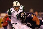 EAST RUTHERFORD, NJ - SEPTEMBER 13:  Mark Sanchez #6 of the New York Jets gets sacked by Haloti Ngata #92 of the Baltimore Ravens during their home opener at the New Meadowlands Stadium on September 13, 2010 in East Rutherford, New Jersey.  (Photo by Andrew Burton/Getty Images)