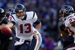 BALTIMORE, MD - JANUARY 15: Quarterback  T.J. Yates #13 of the Houston Texans hands off the ball to teammate  Arian Foster #23 during the AFC Divisional playoff game against the Baltimore Ravens  at M&T Bank Stadium on January 15, 2012 in Baltimore, Maryland. Baltimore won 20-13 in regulation.  (Photo by Rob Carr/Getty Images)