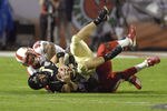 Louisville defensive tackle Amobi Okoye sacks Wake Forest quarterback Riley Skinner during the 73rd annual FedEx Orange Bowl between Louisville and Wake Forest at Dolphin Stadium in Miami, Florida on January 2, 2007. (Photo by A. Messerschmidt/Getty Images)