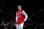 LONDON, ENGLAND - MARCH 06:  Robin van Persie of Arsenal looks on dejected at the final whistle during the UEFA Champions League Round of 16 second leg match between Arsenal and AC Milan at Emirates Stadium on March 6, 2012 in London, England.  (Photo by Laurence Griffiths/Getty Images)