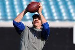 JACKSONVILLE, FL - JANUARY 01: Tight end Dallas Clark #44 of the Indianapolis Colts grabs a warmup pass against the Jacksonville Jaguars January 1, 2012 at EverBank Field in Jacksonville, Florida.  (Photo by Al Messerschmidt/Getty Images)