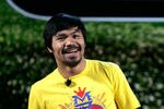 NEW YORK, NY - FEBRUARY 22:  Boxer Manny Pacquiao speaks as Nike introduces new basketball and training technology at Basketball City, Pier 36 on February 22, 2012 in New York City.  (Photo by Mike Lawrie/Getty Images)