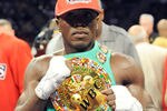 CARSON, CA - SEPTEMBER 27:  Andre Berto poses for a photo after defeating Steve Forbes to retian the belt during their WBC welterweight title bout at the Home Depot Center on September 27, 2008 in Carson, California.  (Photo by Harry How/Getty Images)