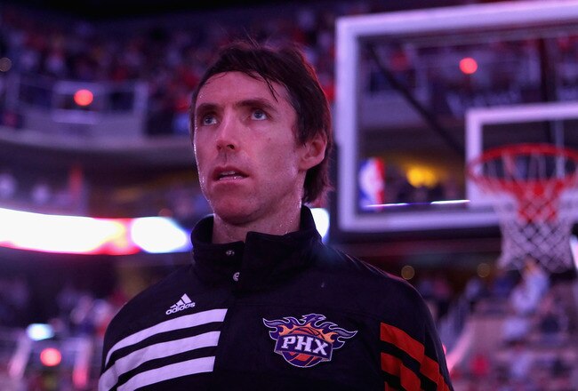 PHOENIX, AZ - APRIL 25:  Steve Nash #13 of the Phoenix Suns stands attended for the National Anthem before the NBA game against the San Antonio Spurs at US Airways Center on April 25, 2012 in Phoenix, Arizona.  The Spurs defeated the Suns 110-106.  NOTE TO USER: User expressly acknowledges and agrees that, by downloading and or using this photograph, User is consenting to the terms and conditions of the Getty Images License Agreement.  (Photo by Christian Petersen/Getty Images)