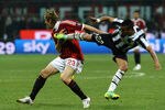 MILAN, ITALY - FEBRUARY 25:  Arturo Vidal (R) of Juventus competes with  Massimo Ambrosini of Milan during the Serie A match between AC Milan and Juventus FC at Stadio Giuseppe Meazza on February 25, 2012 in Milan, Italy.  (Photo by Dino Panato/Getty Images)