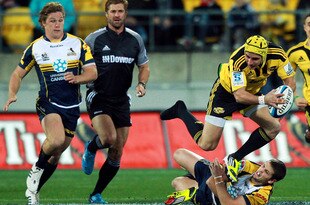 WELLINGTON, NEW ZEALAND - MAY 18:  Andre Taylor of the Hurricanes is tackled by Ian Prior of the Brumbies during the round 13 Super Rugby match between the Hurricanes and the Brumbies at Westpac Stadium on May 18, 2012 in Wellington, New Zealand.  (Photo by Hagen Hopkins/Getty Images)