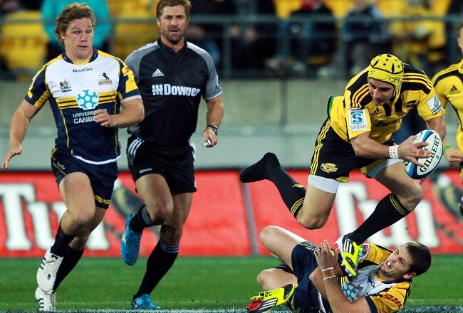 WELLINGTON, NEW ZEALAND - MAY 18:  Andre Taylor of the Hurricanes is tackled by Ian Prior of the Brumbies during the round 13 Super Rugby match between the Hurricanes and the Brumbies at Westpac Stadium on May 18, 2012 in Wellington, New Zealand.  (Photo by Hagen Hopkins/Getty Images)