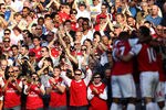 LONDON, ENGLAND - MARCH 24: Fans react after Theo Walcott of Arsenal scores during the Barclays Premier League match between Arsenal and Aston Villal at Emirates Stadium on March 24, 2012 in London, England.  (Photo by Julian Finney/Getty Images)