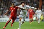 MADRID, SPAIN - APRIL 25:  Mario Gomez of Bayern Munich battles for the ball with Kaka of Real Madrid during the UEFA Champions League Semi Final second leg between Real Madrid CF and Bayern Munich at The Bernabeu Stadium on April 25, 2012 in Madrid, Spain.  (Photo by Jasper Juinen/Getty Images)