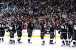 LOS ANGELES, CA - MAY 17:  Members of the Los Angeles Kings celebrate the 2-1 victory against the Phoenix Coyotes in Game Three of the Western Conference Final during the 2012 NHL Stanley Cup Playoffs at Staples Center on May 17, 2012 in Los Angeles, California.  (Photo by Harry How/Getty Images)