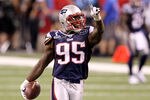 INDIANAPOLIS, IN - FEBRUARY 05:  Mark Anderson #95 of the New England Patriots reacts after he recorded a sack against Eli Manning #10 of the New York Giants during Super Bowl XLVI at Lucas Oil Stadium on February 5, 2012 in Indianapolis, Indiana. The Giants won 21-17. (Photo by Andy Lyons/Getty Images)