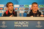 MUNICH, GERMANY - MAY 18:  In this handout image provided by UEFA Philipp Lahm and Bastian Schweinsteiger look on during the FC Bayern Muenchen press conference, ahead of the UEFA Champions League Final between FC Bayern Muenchenand Chelsea at the Fussball Arena München on May 18, 2012 in Munich, Germany.  (Photo by Handout/UEFA via Getty Images)