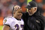 CINCINNATI, OH - JANUARY 01:  Ray Rice #27 of the Baltimore Ravens and offensive coordinator Cam Cameron celebrate as they walk off of the field following the 24-16 win over the Cincinnati Bengals at Paul Brown Stadium on January 1, 2012 in Cincinnati, Ohio.  (Photo by Andy Lyons/Getty Images)