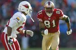 SAN FRANCISCO - DECEMBER 7:  Terrell Owens #81 of the San Francisco 49ers runs a pater against Emmanuel McDaniel #26 of the Arizona Cardinals during an NFL game on December 7, 2003 at Candelstick Park in San Francisco, California.  (Photo by Jed Jacobsohn/Getty Images)