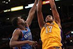 LOS ANGELES, CA - MAY 18:  Andrew Bynum #17 of the Los Angeles Lakers shoots over Nazr Mohammed #8 of the Oklahoma City Thunder in Game Three of the Western Conference Semifinals in the 2012 NBA Playoffs on May at Staples Center on May 18, 2012 in Los Angeles, California.  NOTE TO USER: User expressly acknowledges and agrees that, by downloading and or using this photograph, User is consenting to the terms and conditions of the Getty Images License Agreement.  (Photo by Stephen Dunn/Getty Images)