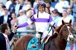 BALTIMORE, MD - MAY 19:  Mario Gutierrez is congratulated by Jack Sisterson after riding I'll Have Another to win the 137th Preakness Stakes at Pimlico Race Course on May 19, 2012 in Baltimore, Maryland.  (Photo by Matthew Stockman/Getty Images)