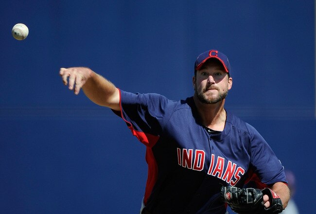 PHOENIX, AZ - MARCH 09:  Starting pitcher Derek Lowe #26 of the Cleveland Indians throws a pitch against the Milwaukee Brewers during a spring training baseball game at Maryvale Baseball Park on March 9, 2012 in Phoenix, Arizona.  (Photo by Kevork Djansezian/Getty Images)