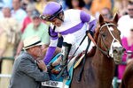 BALTIMORE, MD - MAY 19:  Mario Gutierrez is congratulated by Dennis O'Neill after riding I'll Have Another to win the 137th Preakness Stakes at Pimlico Race Course on May 19, 2012 in Baltimore, Maryland.  (Photo by Matthew Stockman/Getty Images)