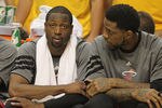 INDIANAPOLIS, IN - MAY 17: (L-R) Mike Miller #13, Dwyane Wade #3 and Undonis Haslem #40 of the Miami Heat sit on the bench near the end of the game against the Indiana Pacers in Game Three of the Eastern Conference Semifinals in the 2012 NBA Playoffs at Bankers Life Fieldhouse on May 17, 2012 in Indianapolis, Indiana. The Pacers defeated the Heat 94-75. NOTE TO USER: User expressly acknowledges and agrees that, by downloading and/or using this photograph, User is consenting to the terms and conditions of the Getty Images License Agreement. (Photo by Jonathan Daniel/Getty Images)