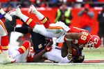 KANSAS CITY, MO - JANUARY 09:  Wide receiver Anquan Boldin #81 of the Baltimore Ravens is hit after a catch by safety Eric Berry #29 of the Kansas City Chiefs in the first half of their 2011 AFC wild card playoff game at Arrowhead Stadium on January 9, 2011 in Kansas City, Missouri.  (Photo by Dilip Vishwanat/Getty Images)