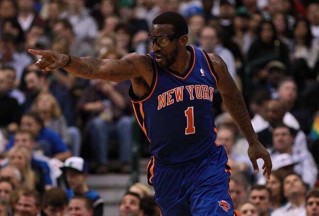 DALLAS, TX - MARCH 06:  Amare Stoudemire #1 of the New York Knicks reacts during play against the Dallas Mavericks at American Airlines Center on March 6, 2012 in Dallas, Texas.  NOTE TO USER: User expressly acknowledges and agrees that, by downloading and or using this photograph, User is consenting to the terms and conditions of the Getty Images License Agreement.  (Photo by Ronald Martinez/Getty Images)