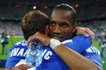 MUNICH, GERMANY - MAY 19:  Didier Drogba and Branislav Ivanovic of Chelsea celebrate after their victory in the UEFA Champions League Final between FC Bayern Muenchen and Chelsea at the Fussball Arena München on May 19, 2012 in Munich, Germany.  (Photo by Laurence Griffiths/Getty Images)