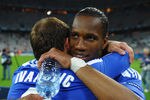 MUNICH, GERMANY - MAY 19:  Didier Drogba and Branislav Ivanovic of Chelsea celebrate after their victory in the UEFA Champions League Final between FC Bayern Muenchen and Chelsea at the Fussball Arena München on May 19, 2012 in Munich, Germany.  (Photo by Laurence Griffiths/Getty Images)