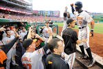 WASHINGTON, DC - MAY 19:  Adam Jones #10 of the Baltimore Orioles celebrates with teammates after hitting a home run in the third inning against the Washington Nationals at Nationals Park on May 19, 2012 in Washington, DC.  (Photo by Greg Fiume/Getty Images)