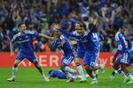MUNICH, GERMANY - MAY 19:  (L-R) Gary Cahill, Florent Malouda, Fernando Torres and Jose Bosingwa of Chelsea celebrate after Didier Drogba scored the winning penalty during UEFA Champions League Final between FC Bayern Muenchen and Chelsea at the Fussball Arena München on May 19, 2012 in Munich, Germany.  (Photo by Mike Hewitt/Getty Images)