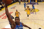 LOS ANGELES, CA - MAY 19:  Kevin Durant #35 of the Oklahoma City Thunder goes up for a dunk in front of Metta World Peace #15 of the Los Angeles Lakers in the first half in Game Four of the Western Conference Semifinals in the 2012 NBA Playoffs on May 19 at Staples Center in Los Angeles, California. NOTE TO USER: User expressly acknowledges and agrees that, by downloading and or using this photograph, User is consenting to the terms and conditions of the Getty Images License Agreement.  (Photo by Stephen Dunn/Getty Images)