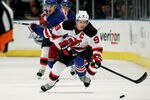NEW YORK, NY - MAY 16:  Zach Parise #9 of the New Jersey Devils controls the puck in Game Two of the Eastern Conference Final against the New York Rangers during the 2012 NHL Stanley Cup Playoffs at Madison Square Garden on May 16, 2012 in New York City.  (Photo by Bruce Bennett/Getty Images)