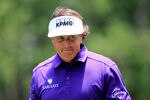 PONTE VEDRA BEACH, FL - MAY 12:  Phil Mickelson of the United States looks on from the ninth hole during the third round of THE PLAYERS Championship held at THE PLAYERS Stadium course at TPC Sawgrass on May 12, 2012 in Ponte Vedra Beach, Florida.  (Photo by Sam Greenwood/Getty Images)