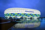 MUNICH, GERMANY - UNDATED: (EDITORIAL USE ONLY - NO COMMERCIALS) In
 this handout image from the Allianz Group, the Allianz Arena is illuminated with white, green and blue lights ahead of the UEFA Champions League Final between FC Bayern Munich and Chelsea. The final takes place at the Allianz Arena on May 19, 2012. (Photo by Allianz Group via Getty Images)